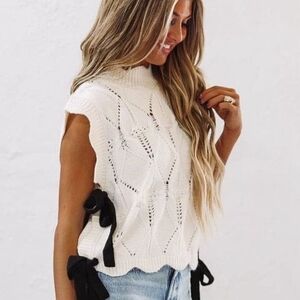 ↠ Mable Sleeveless Knit Scalloped Mock Turtleneck Sweater with Black Side Bows